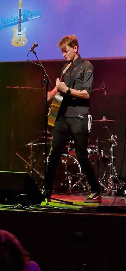 Our student William playing bass guitar with his band Bluesalot at the Swiss Blues Festival.